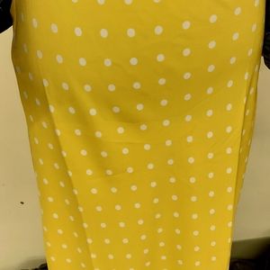 The Loft XSP Yellow Skirt with White Polka Dots. The has side slit on each side